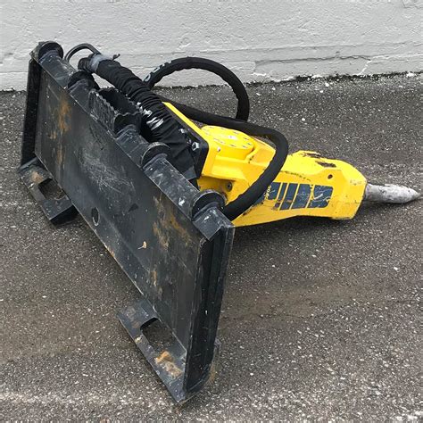 skid steer with grapple rental near me|bobcat with jackhammer attachment rental.